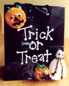 image of a bag with knitted Halloween decorations